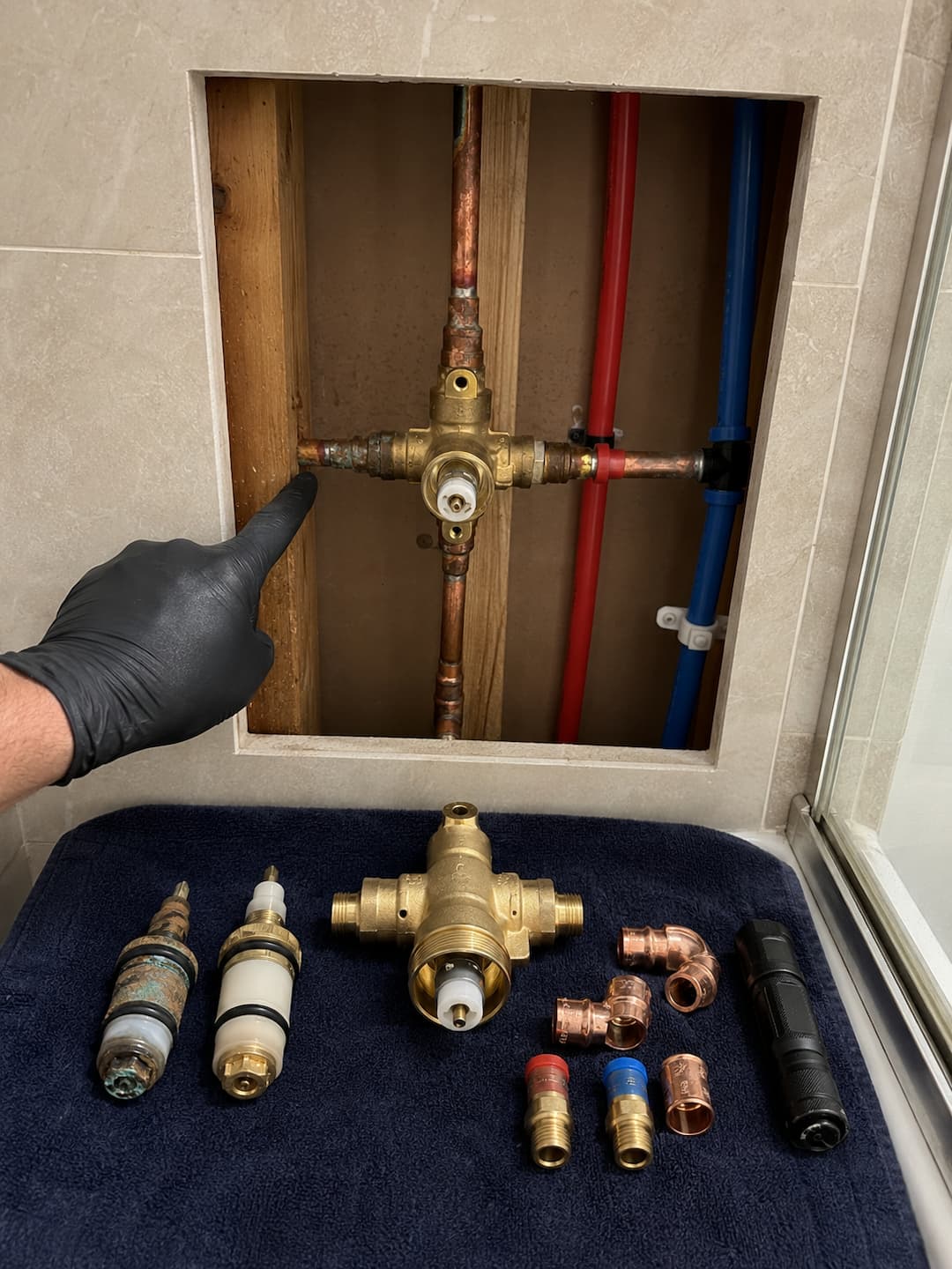 Shower valve access and moisture inspection before repair or replacement